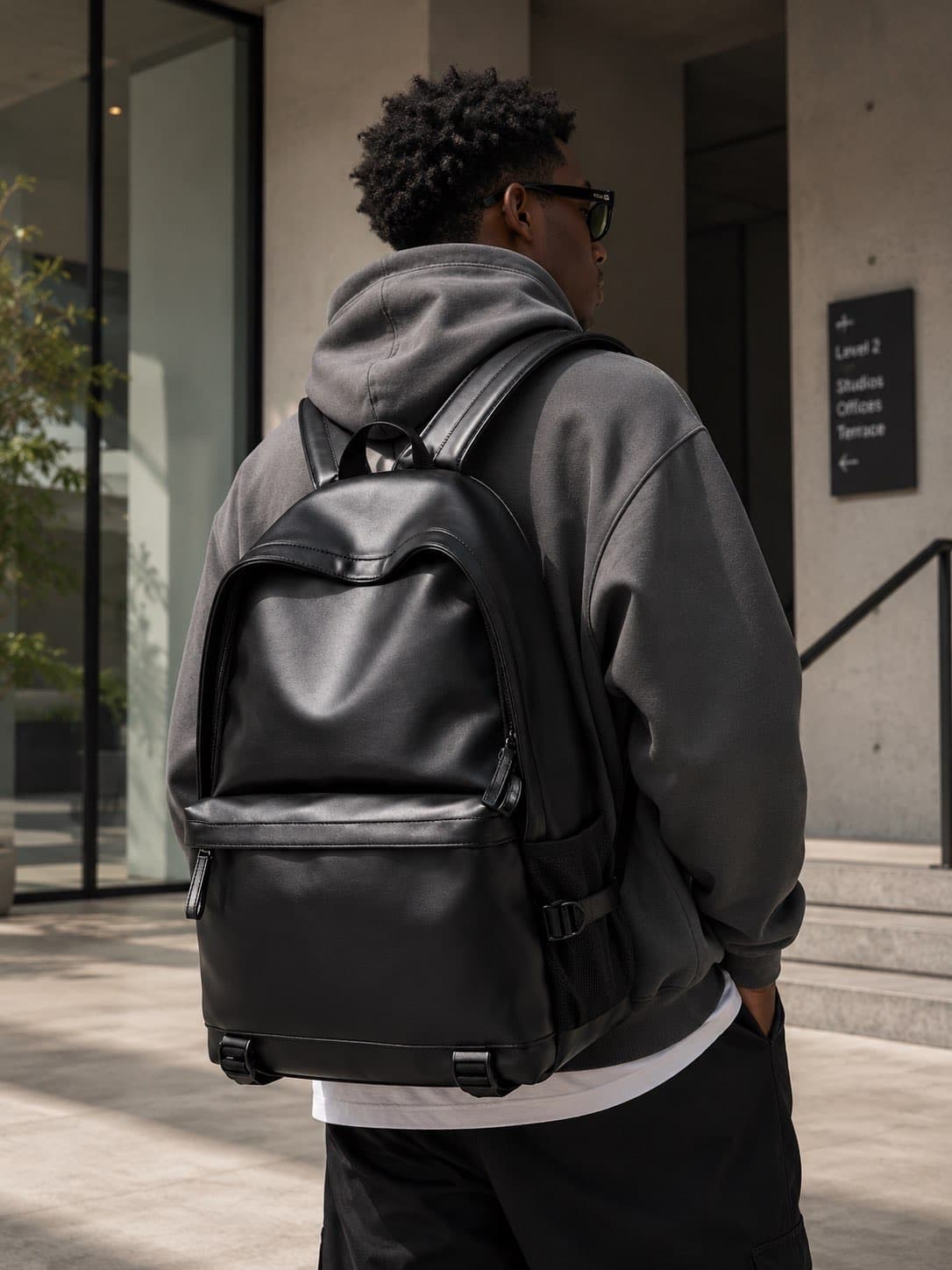 All-Black Faux-Leather Backpack
